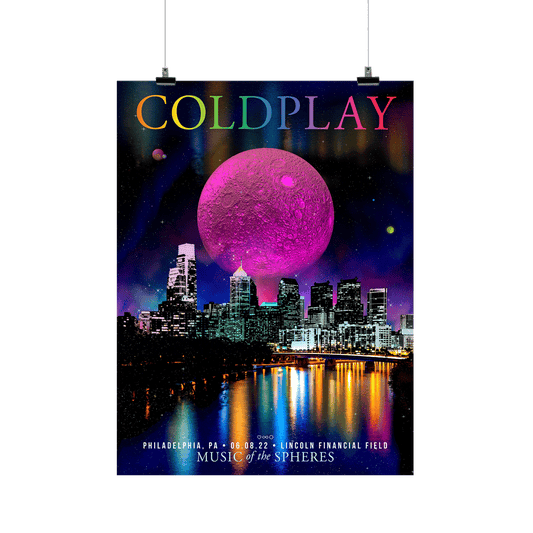 a largePinkNeonMoon glowsInANightSky, with a yellowNeonMoon,&aPink&orangePlanet, aboveCityLandmarks: 1LibertyPlace,&itsShorterSibling, 2LibertyPlace: 2TallSkyscrapersWith a glassDome, roundAtrium flankedByColumns,&facadesOfGlass&granite, inGray, silver&metallicBlue. ComcastCenterWith a glassCurtainWall, winter garden, plaza&a⛲️BNYMellonCenter,&FMCTower viewingIntoThe Schuylkill River, thatReflectsThe glowingBuildingLights. COLDPLAYWritten in neonColorsOfThe🌈MUSIC OF THE SPHERES, date&venue